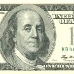 The face of Benjamin Franklin on the hundred dollar bill